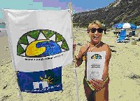 Naturist on Bates Beach with signs and brochure